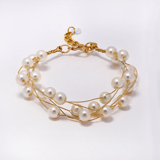 Intertwined multi strand round shaped faux pearl bracelet - YB5296