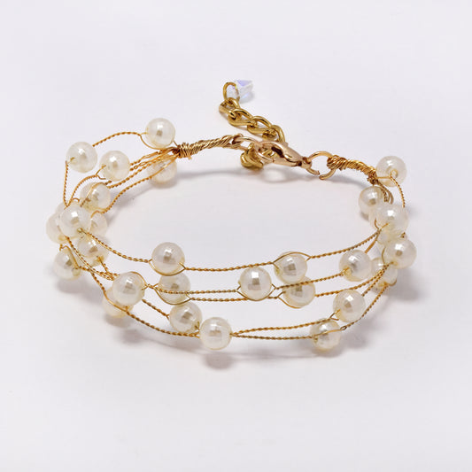 Intertwined multi strand faceted faux pearl bracelet - YB5299