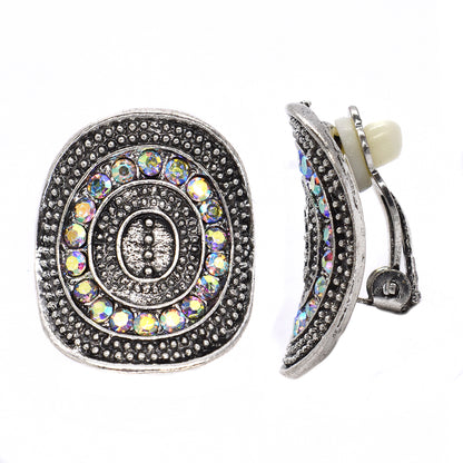 Oval curved oxidized clip on fashion earring with stones