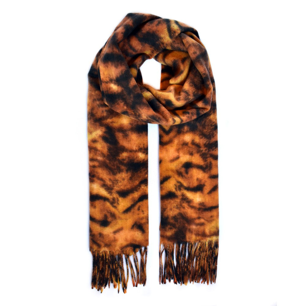 Luxuriously soft animal print scarf with tassels